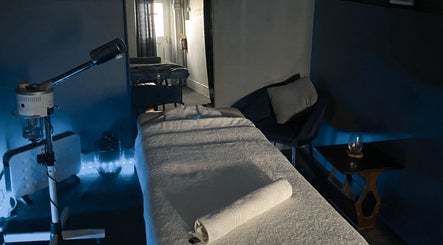 Massage room at Body Shop Studio For Men in Cape Town, ZA, featuring a serene setup with a massage table.