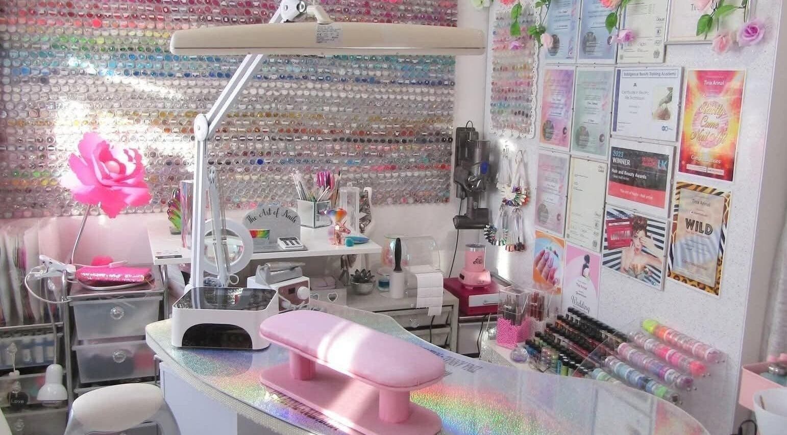 Inside 'The Art of Nails' in Trowbridge, England, GB with a vibrant setup for nail artistry.