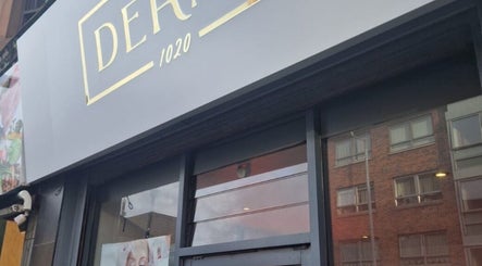 Front view of Derma's elegant exterior in Glasgow, Scotland, GB, showcasing modern architecture.