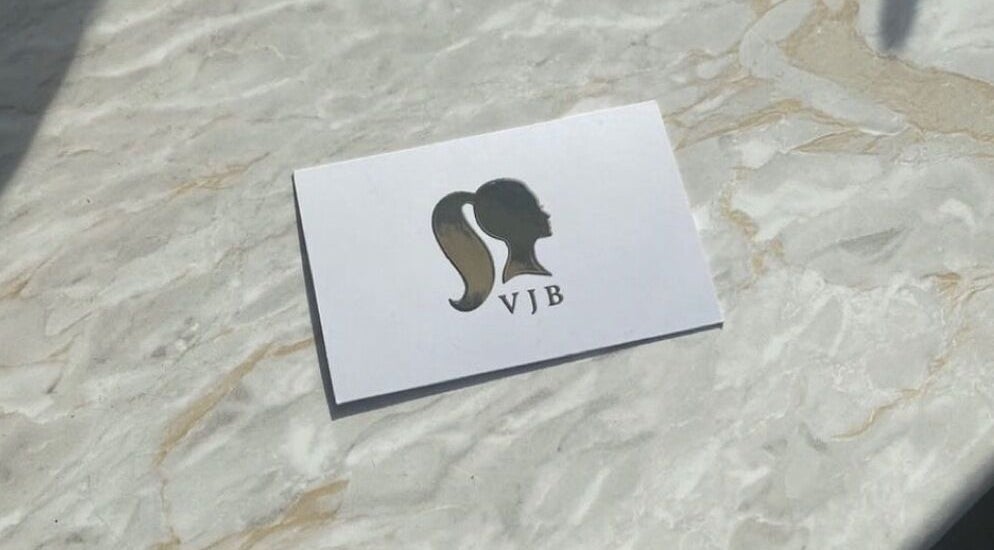 Victoria Joy Beauty logo on marble surface, York, England, GB.