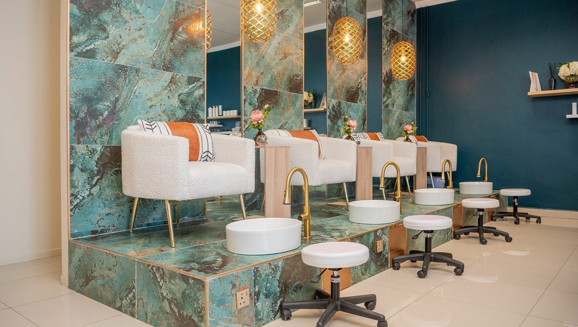 Luxurious pedicure area at Nomlu Nail Bar- Airport Junction, Gaborone, Gaborone City, BW with plush seating.