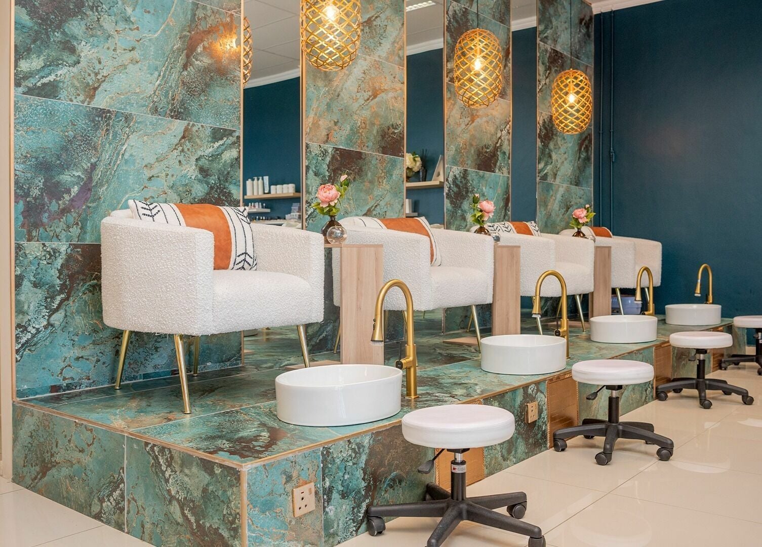 Luxurious pedicure area at Nomlu Nail Bar- Airport Junction, Gaborone, Gaborone City, BW with plush seating.