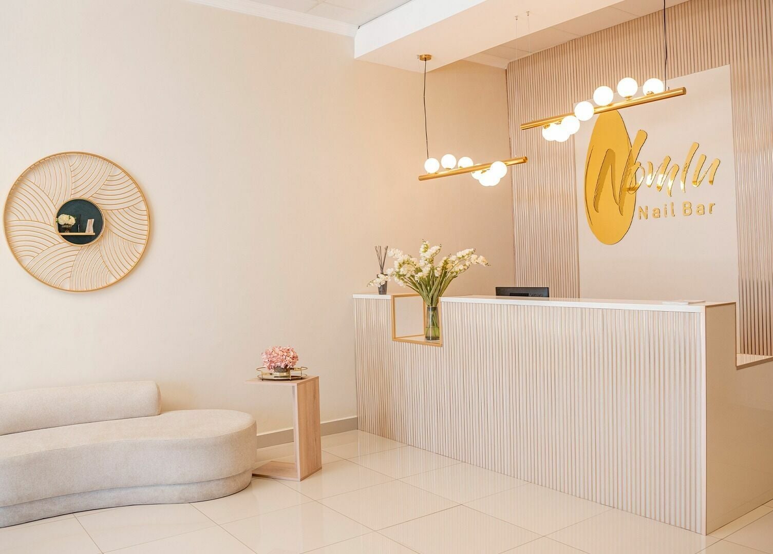 Reception area of Nomlu Nail Bar- Airport Junction in Gaborone, Gaborone City, BW with elegant decor.