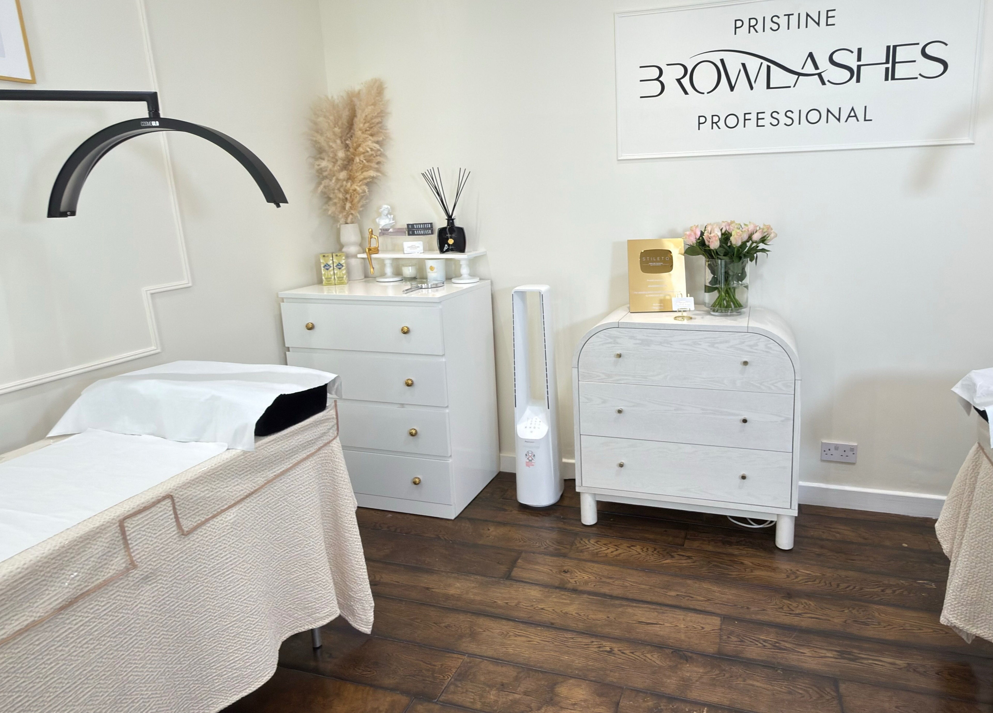 Calming and stylish treatment room at Pristine BrowLashes Professional, London, England, GB.