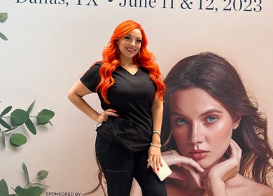 Professional at Waxed by Jan, El Paso, Texas, US, in front of elegant, nature-inspired backdrop.