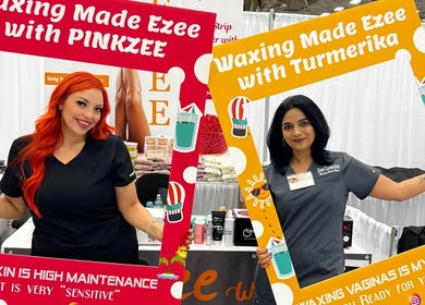 Two women hold colorful frames at Waxed by Jan in El Paso, Texas, US, showcasing vibrant waxing services.