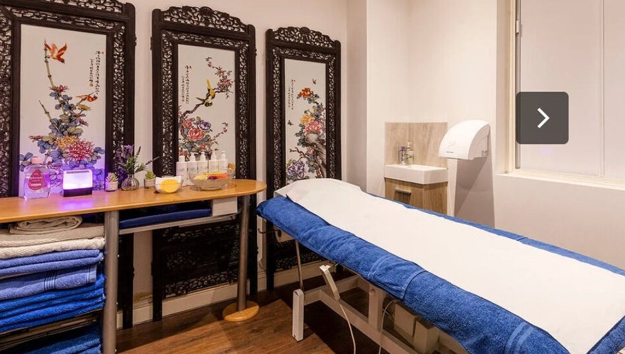 Peaceful treatment room at Reborn Clinic, London, England, GB with elegant decor and calming ambience.