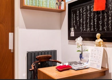 Elegant study corner at Reborn Clinic, London, England, GB, featuring traditional decor and calming aesthetics.