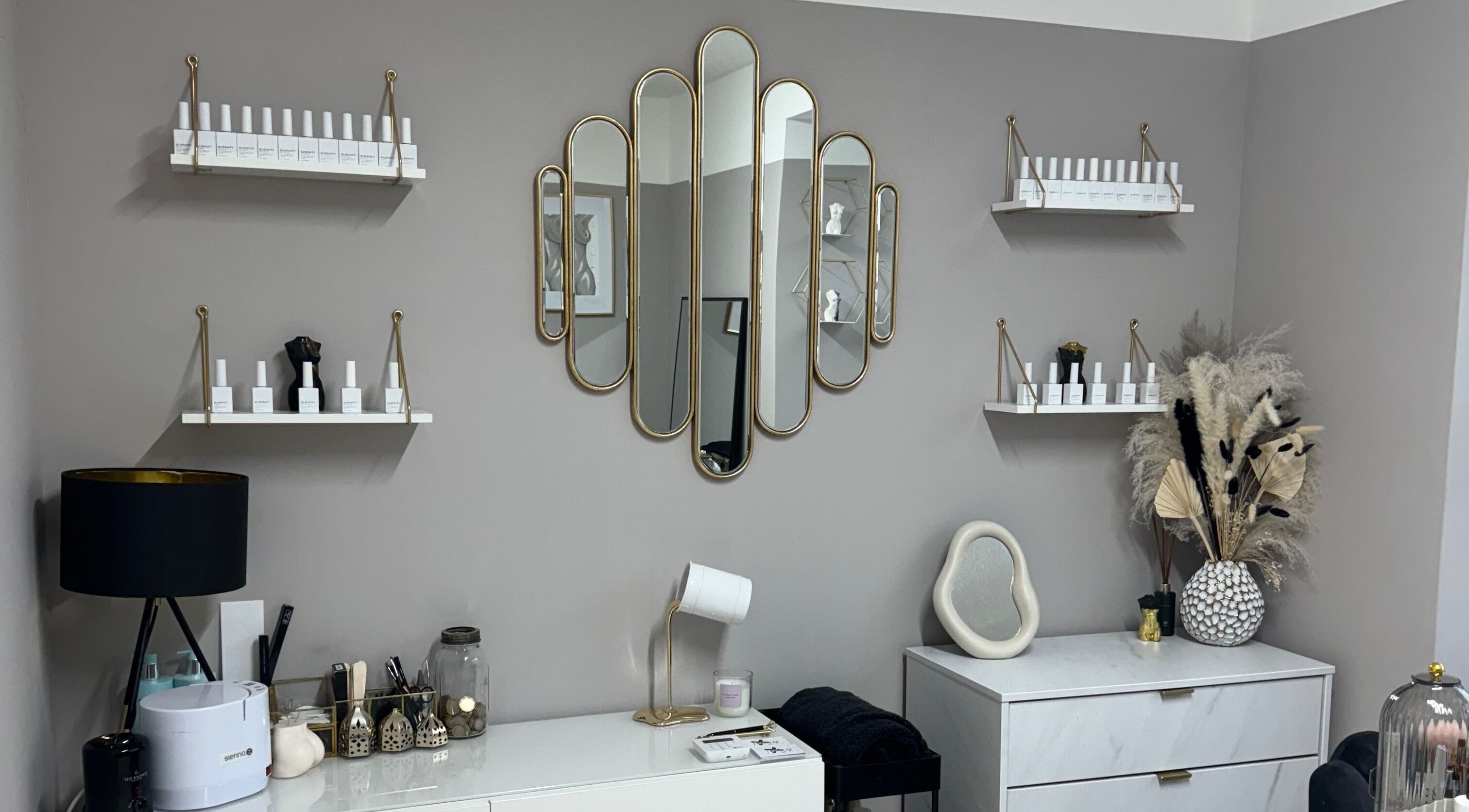 Elegant interior of Nailed by Lish in Sudbury, England, GB featuring stylish mirrors and decor.