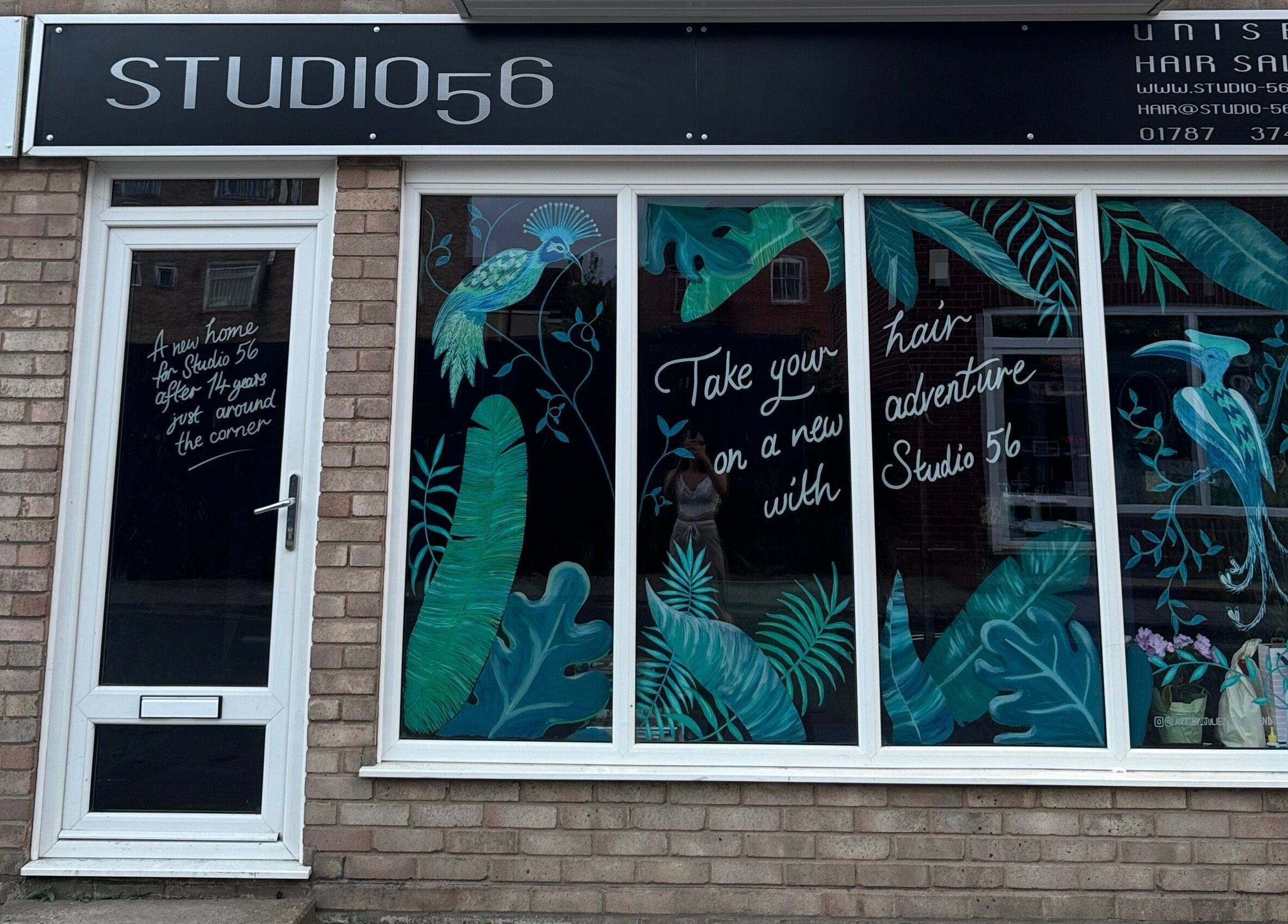 Studio 56 salon facade with vibrant tropical theme in Sudbury near Nailed by Lish, England, GB.