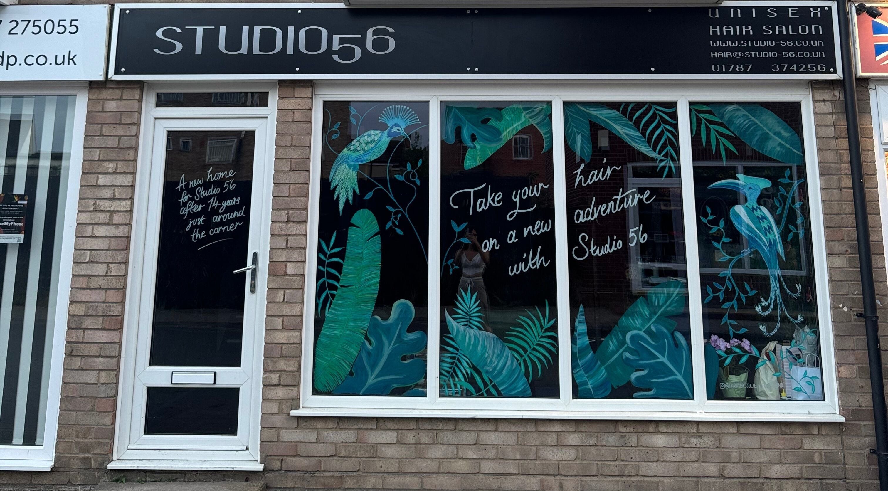 Studio 56 salon facade with vibrant tropical theme in Sudbury near Nailed by Lish, England, GB.