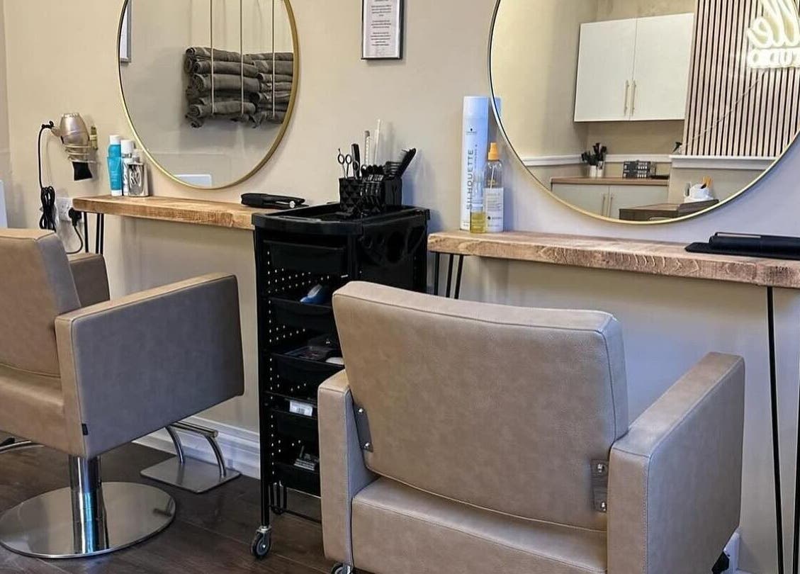 Chic salon styling chairs and mirrors at Look and Lash, Alnwick, England, GB, offering a luxury beauty experience.