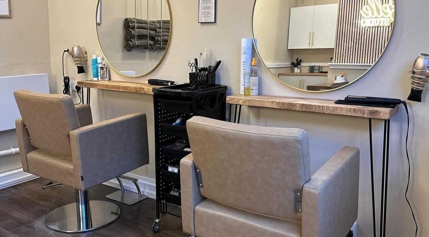 Chic salon styling chairs and mirrors at Look and Lash, Alnwick, England, GB, offering a luxury beauty experience.