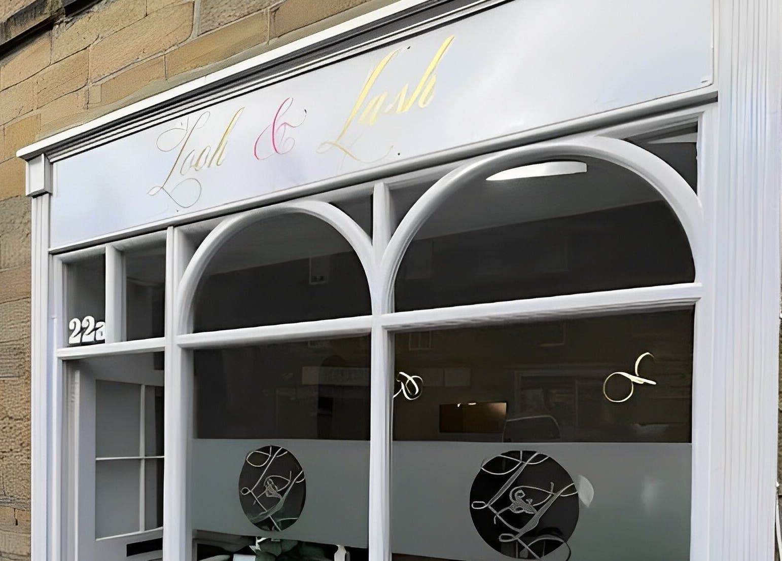 Look and Lash entrance with elegant signage at 22A Alnwick, England, GB.