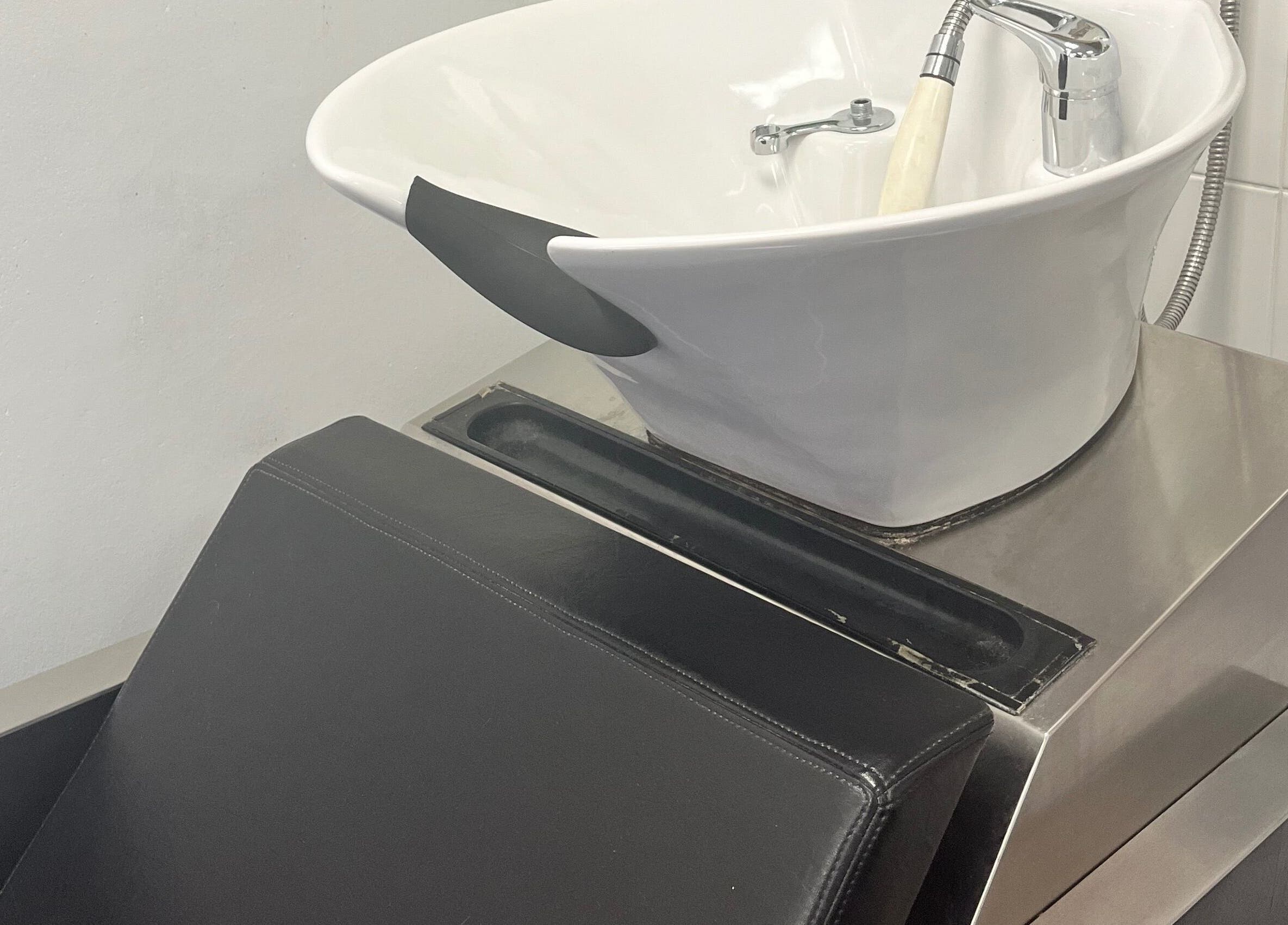 Stylish hair wash basin at The Salon His and Hers Broughton Astley, Broughton Astley, England, GB.