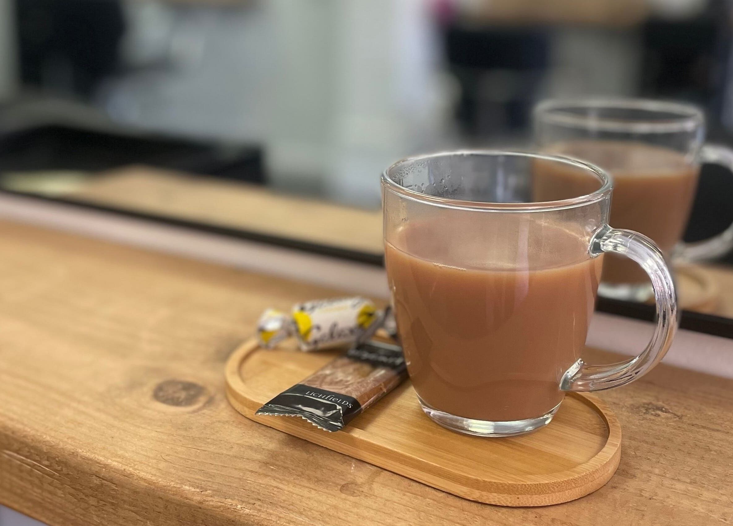 Cozy tea setup at The Salon His and Hers Broughton Astley, Broughton Astley, England, GB, highlighting comfort.
