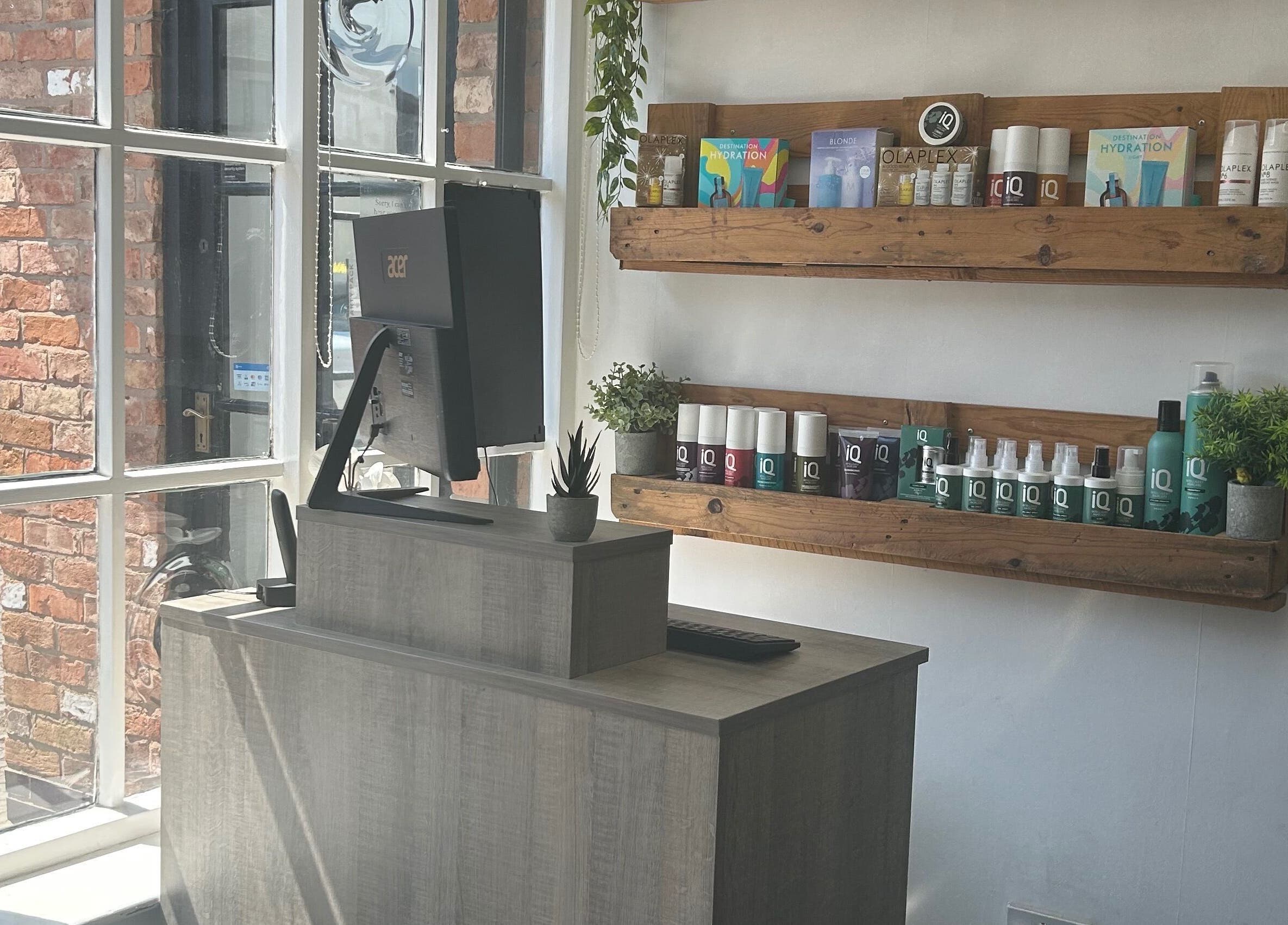 Reception area at The Salon His and Hers Broughton Astley, Broughton Astley, England, GB with natural light.
