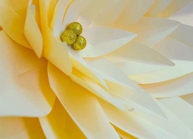 Close-up of a decorative golden bloom at The Wax Bar, Bridgetown, Christ Church, BB.