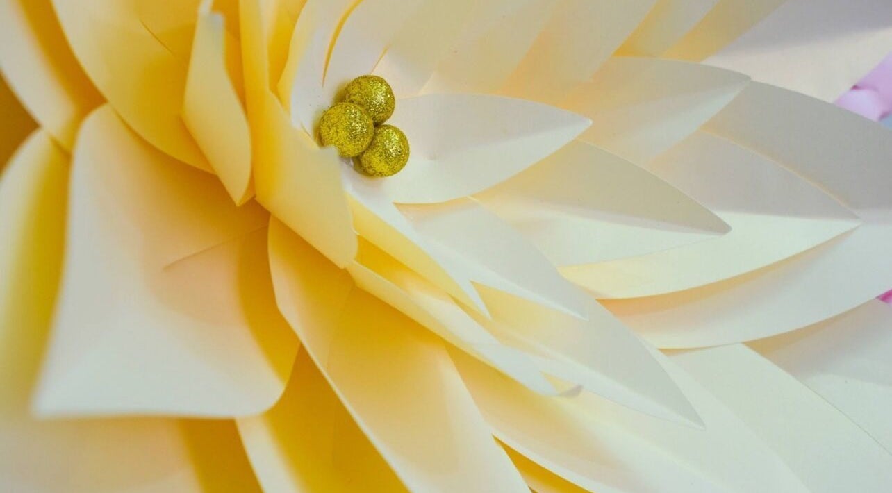Close-up of a decorative golden bloom at The Wax Bar, Bridgetown, Christ Church, BB.