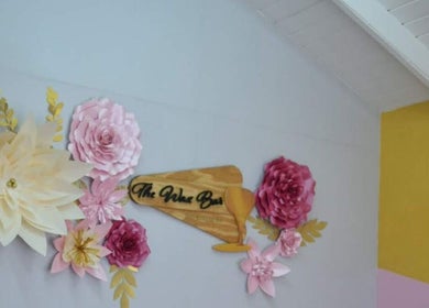 Elegant floral decor at The Wax Bar in Bridgetown, Christ Church, BB accentuates a warm and welcoming atmosphere.