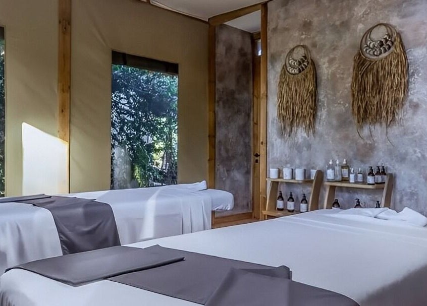 Relaxing massage room at Spa By Xenaxia At Movenpick in Nairobi, Nairobi County, KE with serene decor.