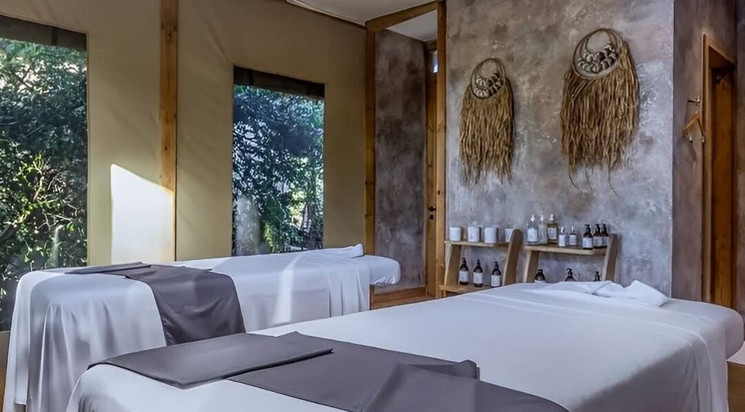 Relaxing massage room at Spa By Xenaxia At Movenpick in Nairobi, Nairobi County, KE with serene decor.