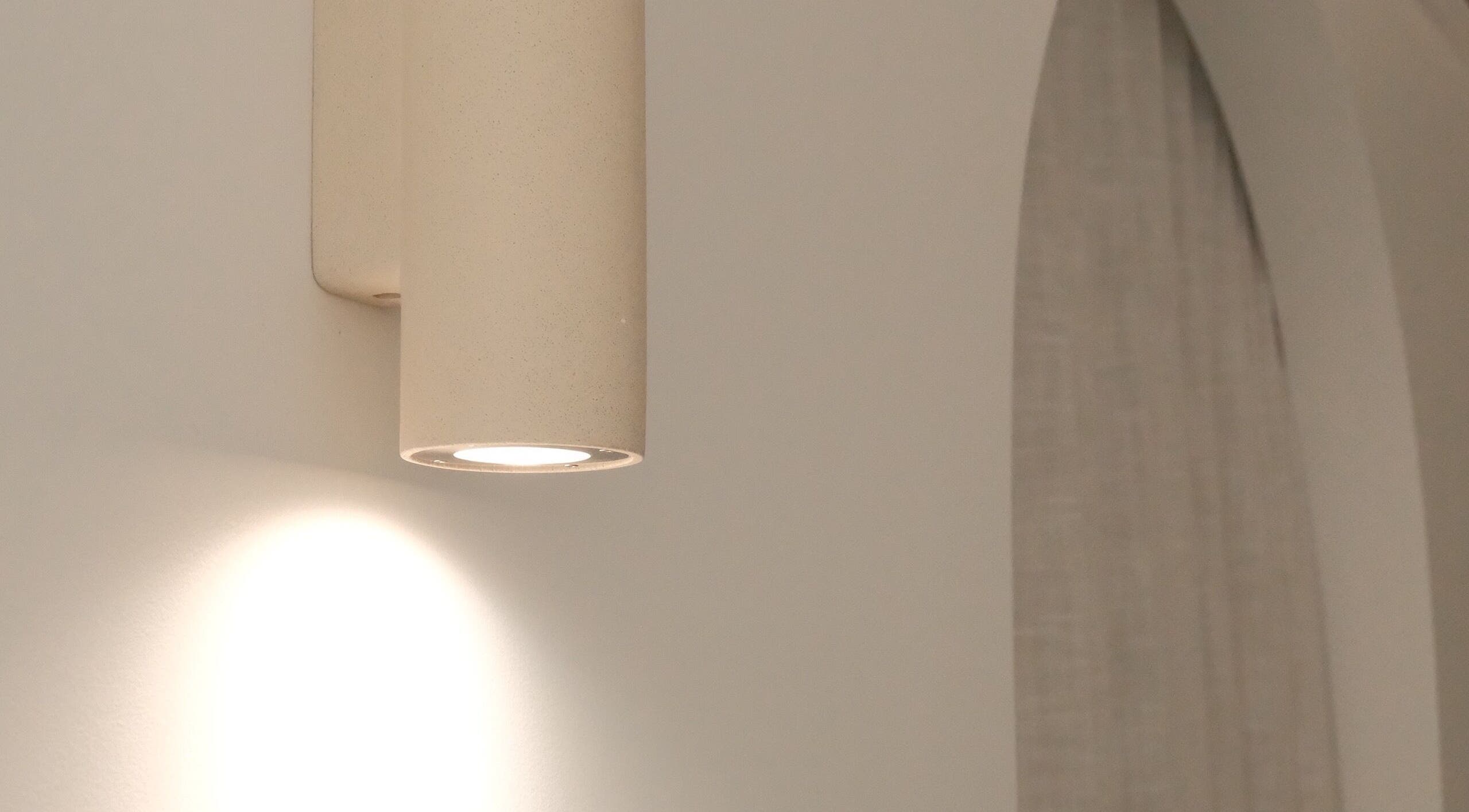 Modern wall light at MP Lash Artistry in Narellan, New South Wales, AU, highlighting sleek interior design.