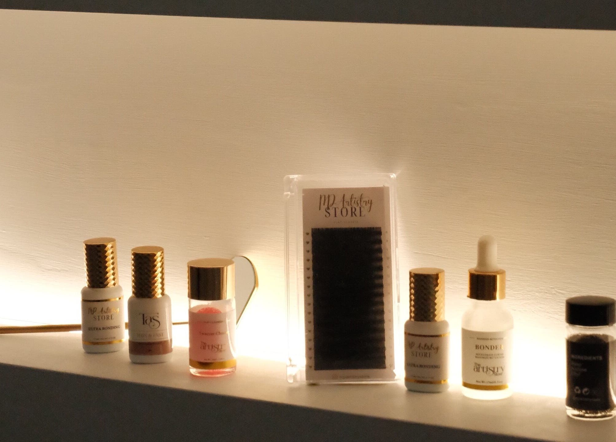 Premium lash products on a shelf at MP Lash Artistry, Narellan, New South Wales, AU showcasing beauty standards.