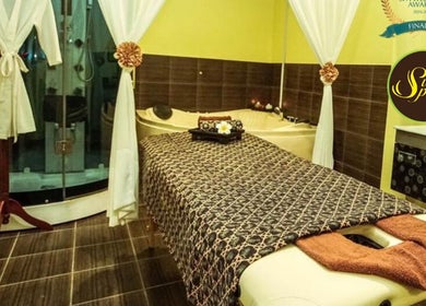 Relaxation room at Sutera Spa Kemaman in Chukai, Terengganu, MY featuring massage table and luxurious decor.