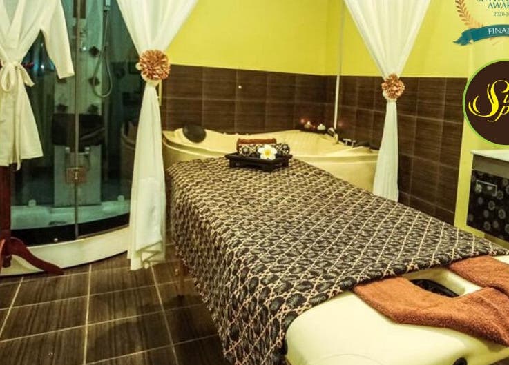 Relaxation room at Sutera Spa Kemaman in Chukai, Terengganu, MY featuring massage table and luxurious decor.