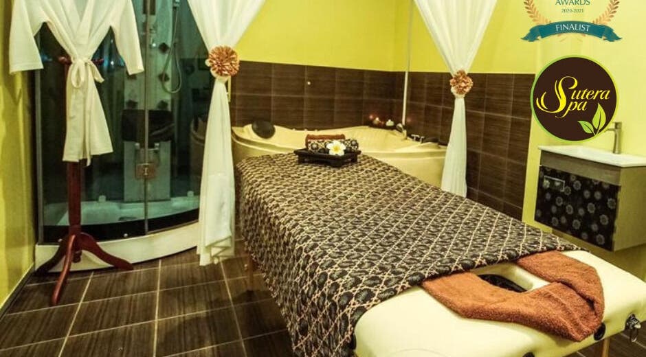 Relaxation room at Sutera Spa Kemaman in Chukai, Terengganu, MY featuring massage table and luxurious decor.