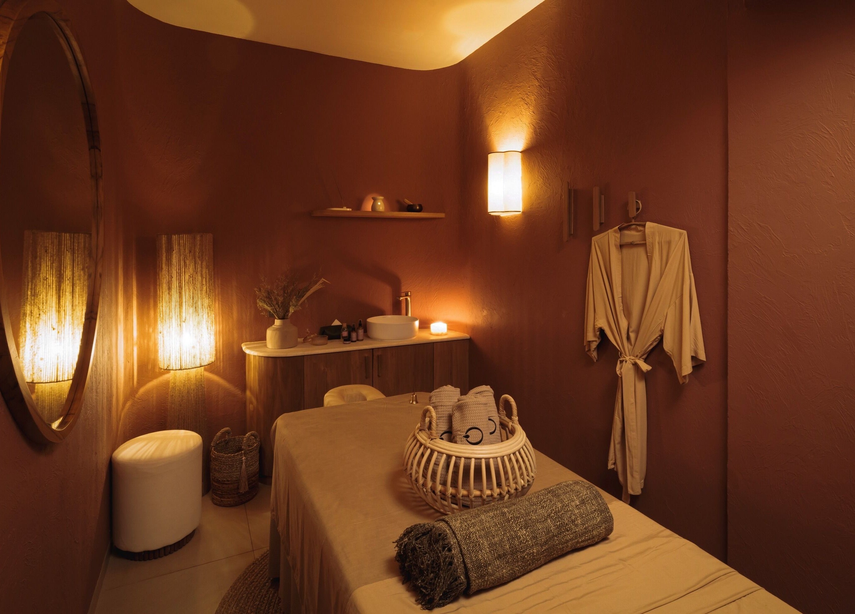 Cozy massage room at You Spa Umalas, Bali, Bali, ID featuring ambient lighting and calming decor.