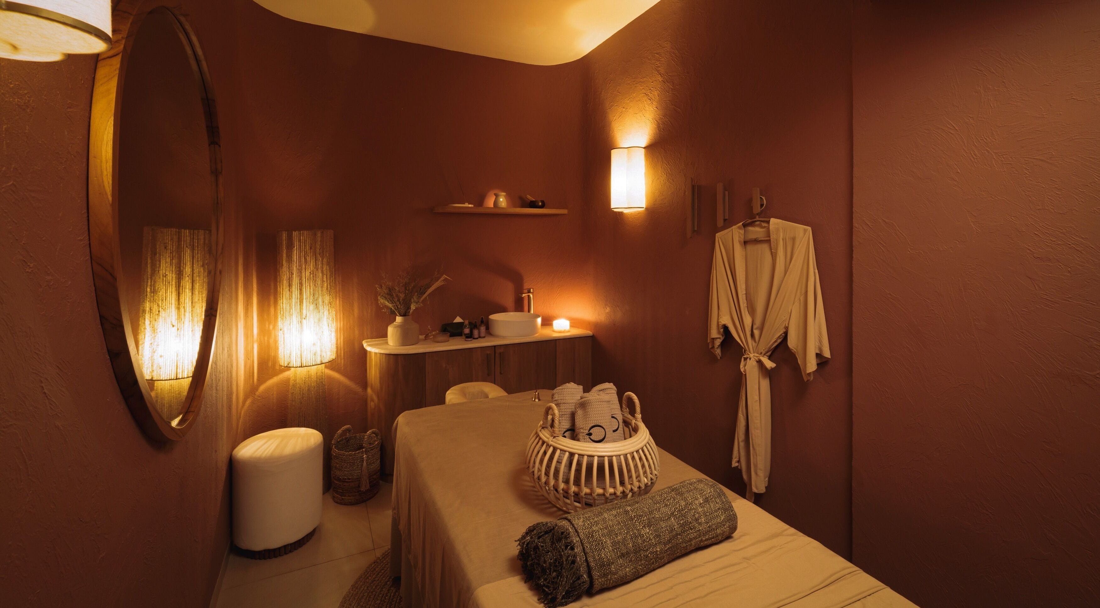 Cozy massage room at You Spa Umalas, Bali, Bali, ID featuring ambient lighting and calming decor.