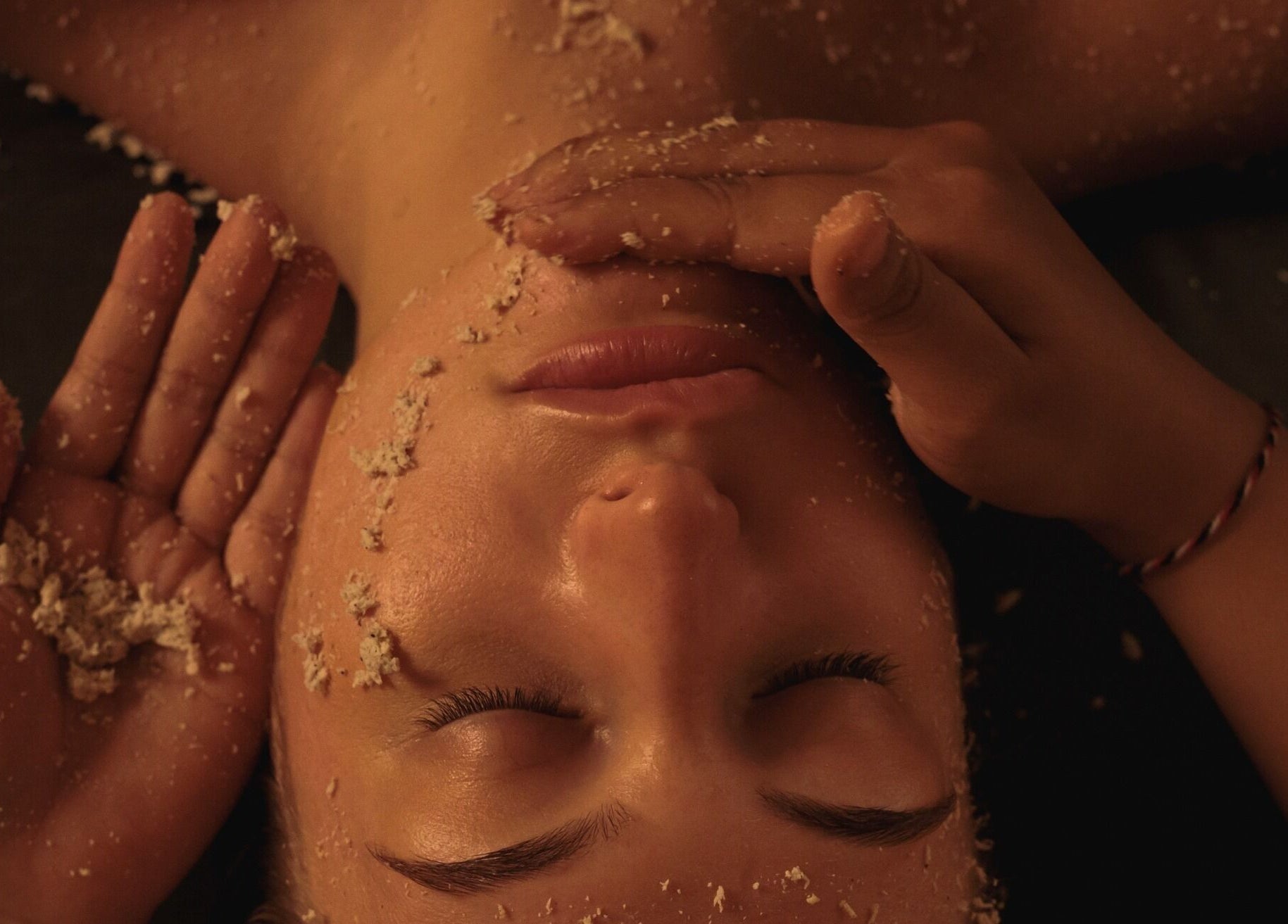 Exfoliating facial treatment at You Spa Umalas, Bali, Bali, ID, highlighting soothing skincare ritual.