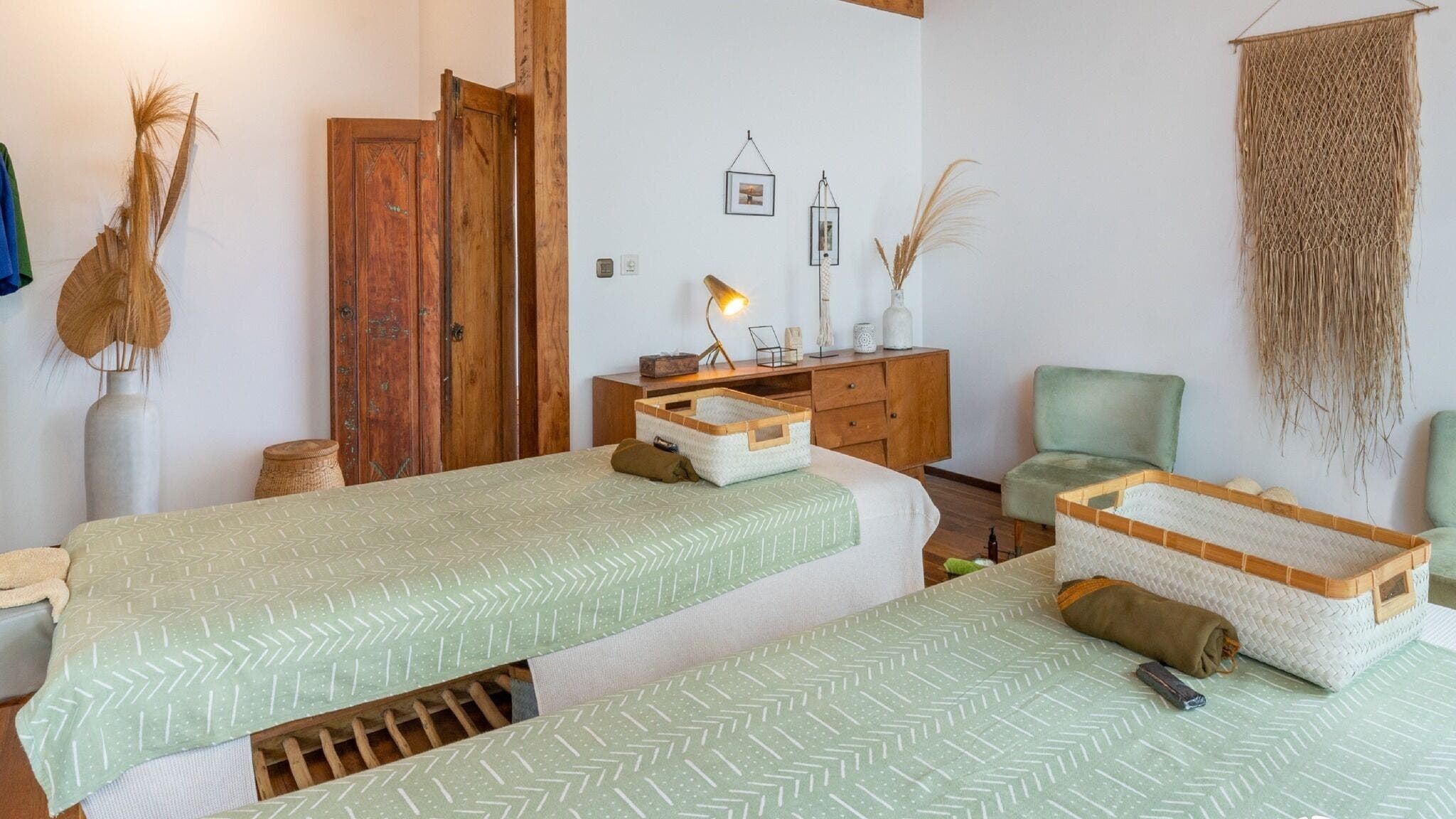 Relaxing treatment room at You Spa Gili Trawangan, Nusa Tenggara occidental, ID, featuring serene decor.