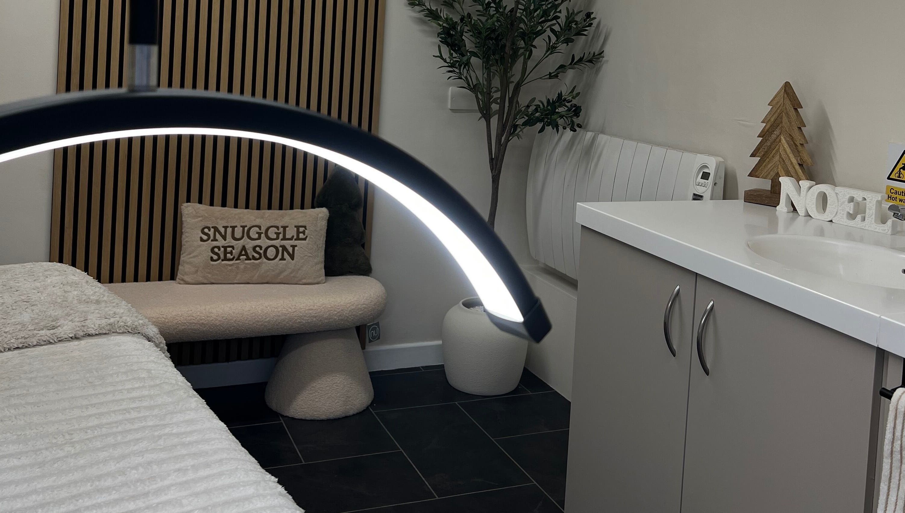 Relaxed spa setting at Blush and Bloom Cosmetics in Nantwich, England, GB with cozy decor and inviting ambiance.