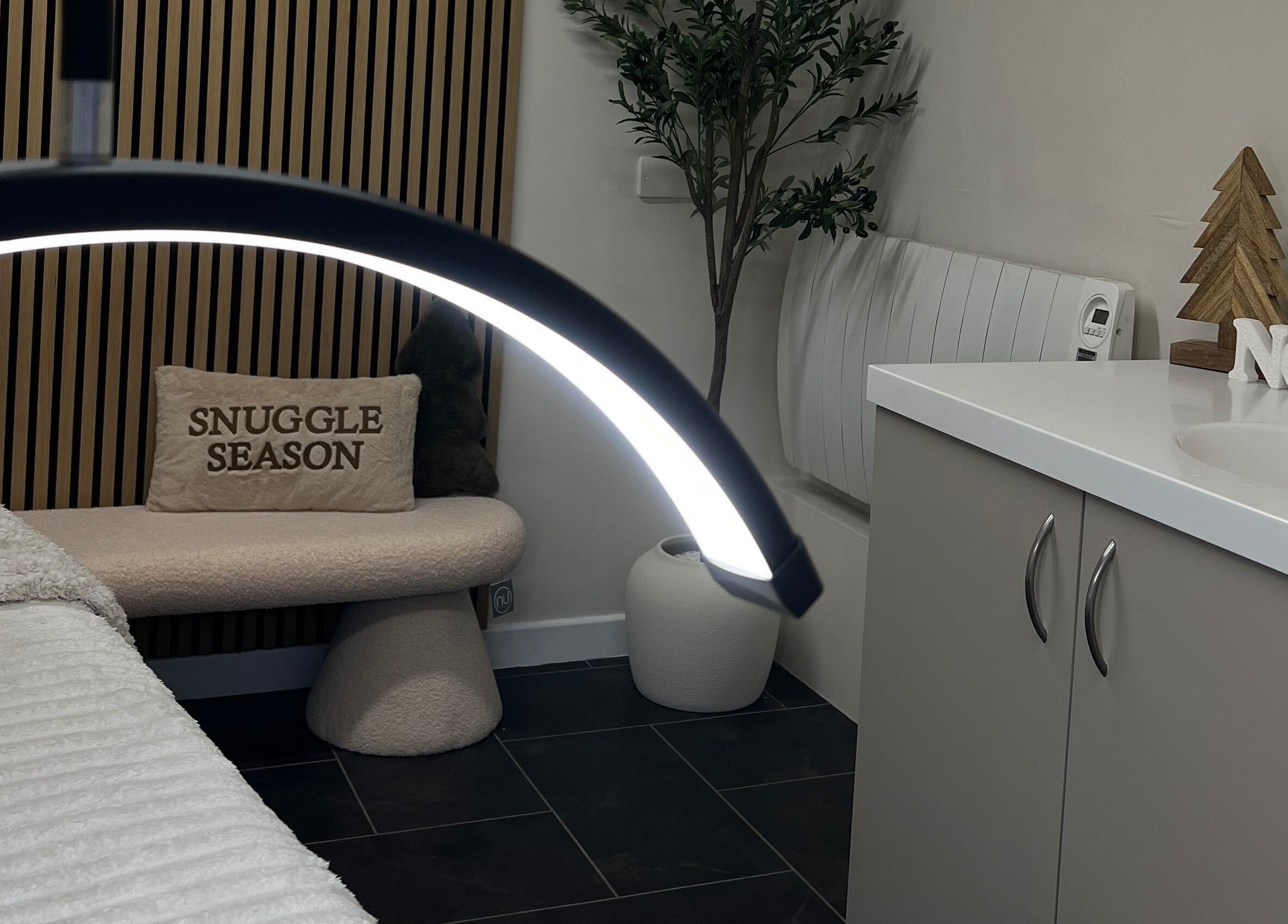 Relaxed spa setting at Blush and Bloom Cosmetics in Nantwich, England, GB with cozy decor and inviting ambiance.