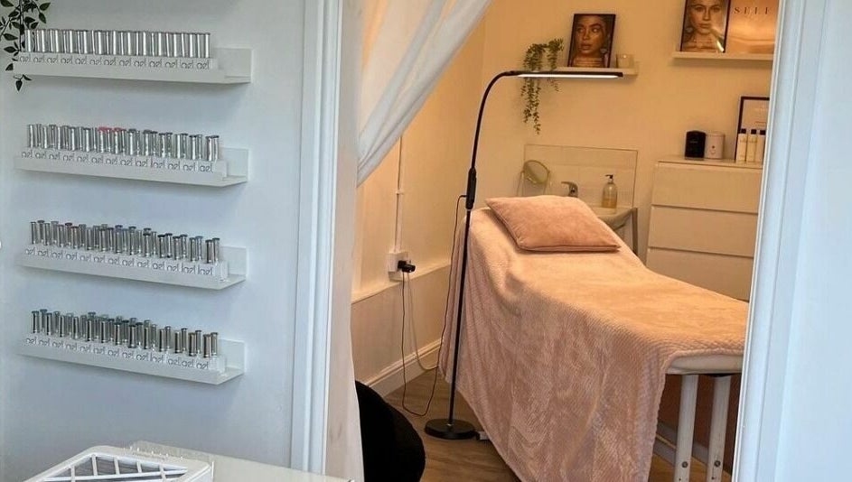 Relaxing spa room at Stef Hayes Hair in Bude, England, GB, showcasing a tranquil treatment bed.