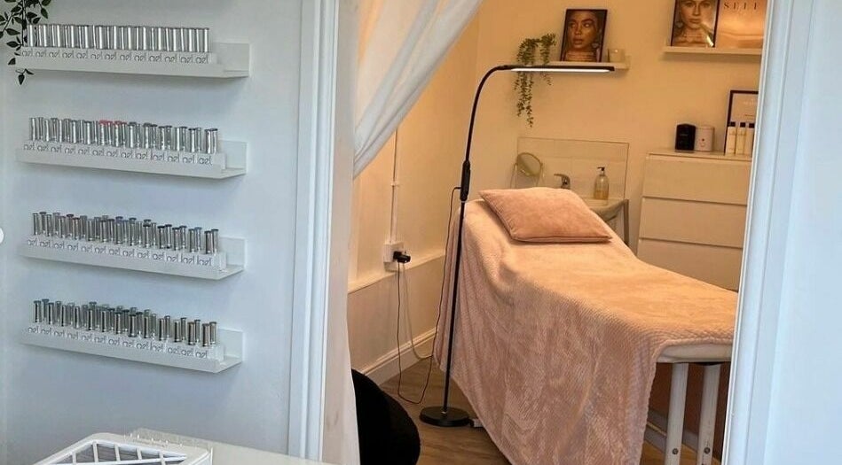 Relaxing spa room at Stef Hayes Hair in Bude, England, GB, showcasing a tranquil treatment bed.
