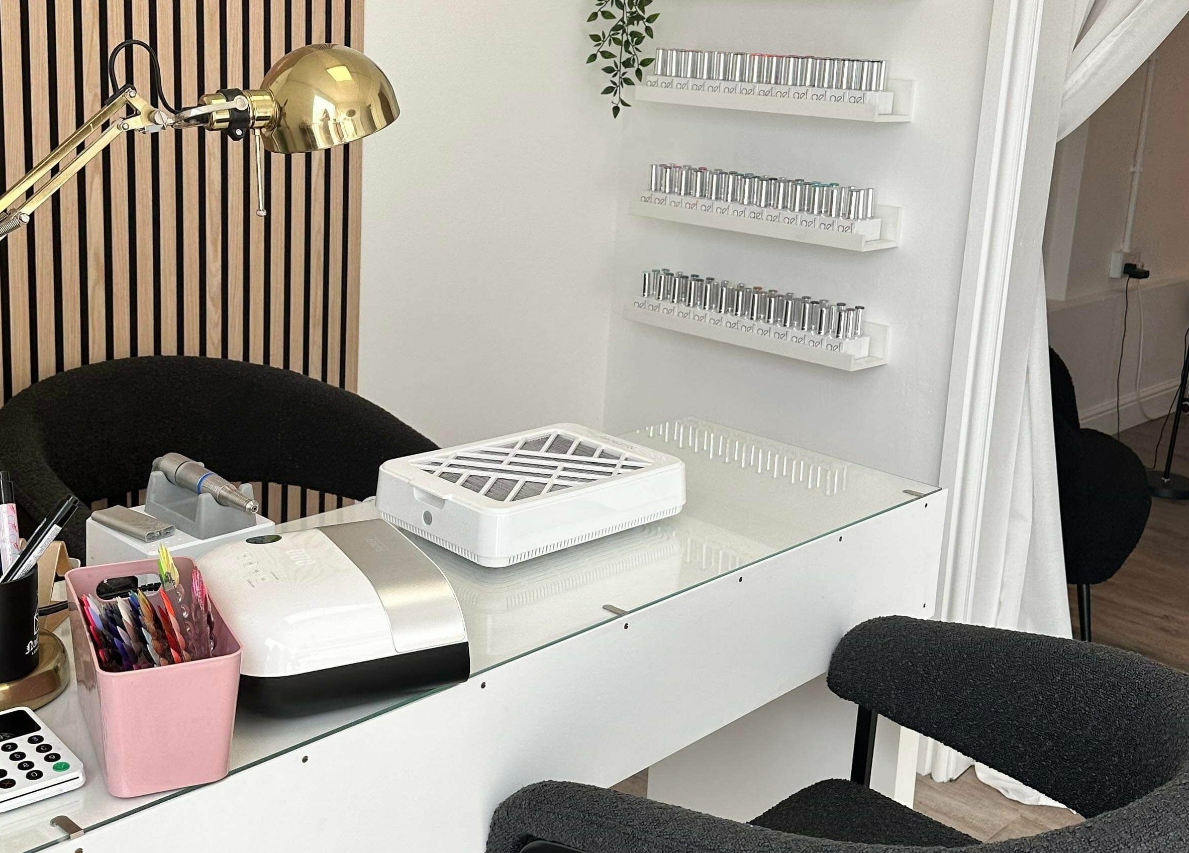 Modern nail station at Stef Hayes Hair, Bude, England, GB featuring sleek decor and nail tools.