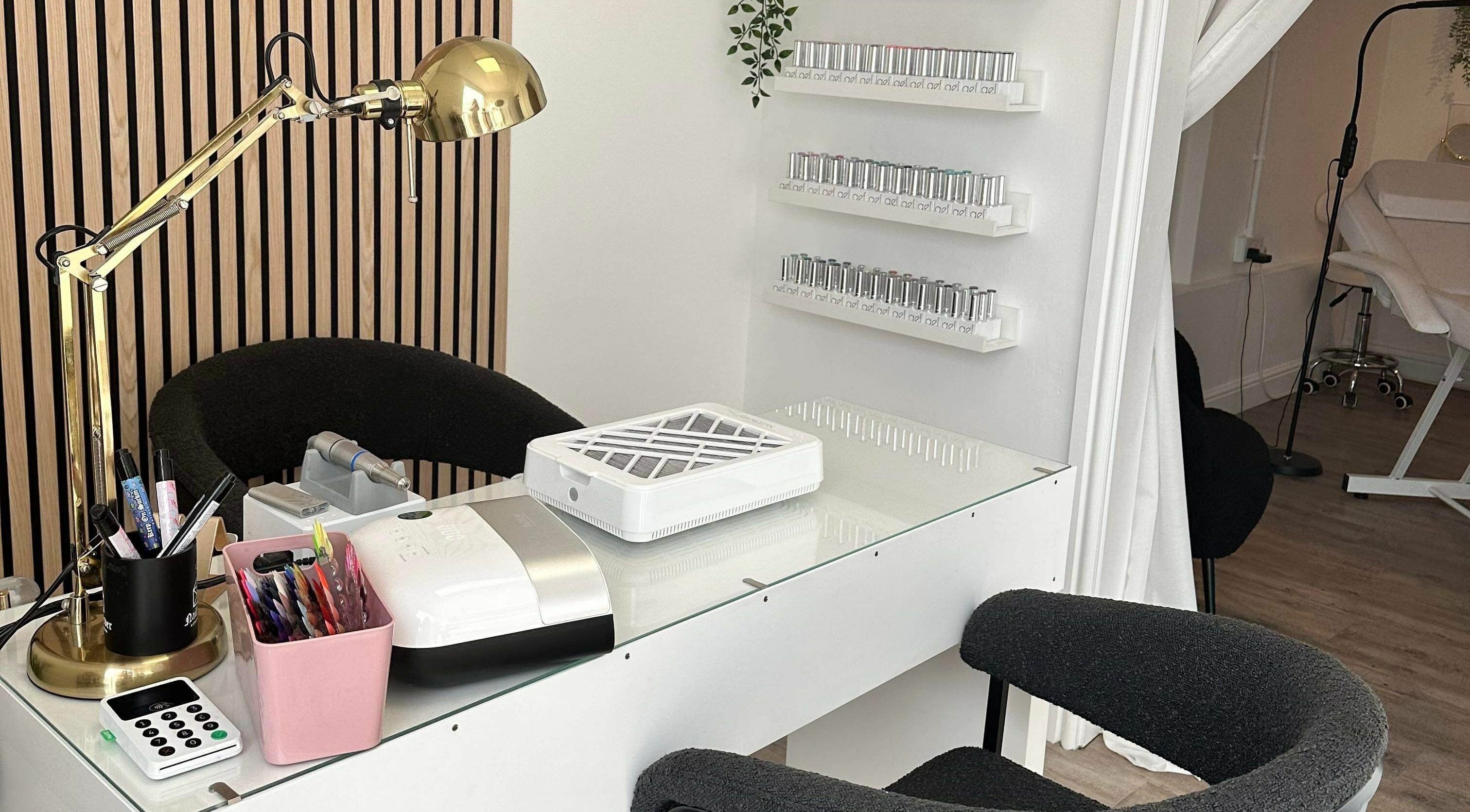 Modern nail station at Stef Hayes Hair, Bude, England, GB featuring sleek decor and nail tools.