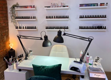 Nail station at The Beauty Shed, Hulland Village, England, GB, with neatly arranged products.