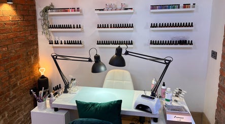Nail station at The Beauty Shed, Hulland Village, England, GB, with neatly arranged products.