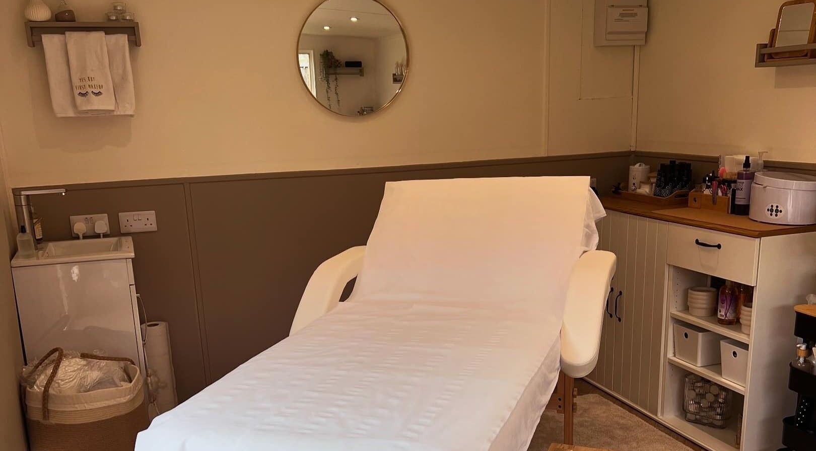 Elegant treatment room at The Beauty Hideaway in Tadcaster, England, GB, featuring a comfortable massage table.