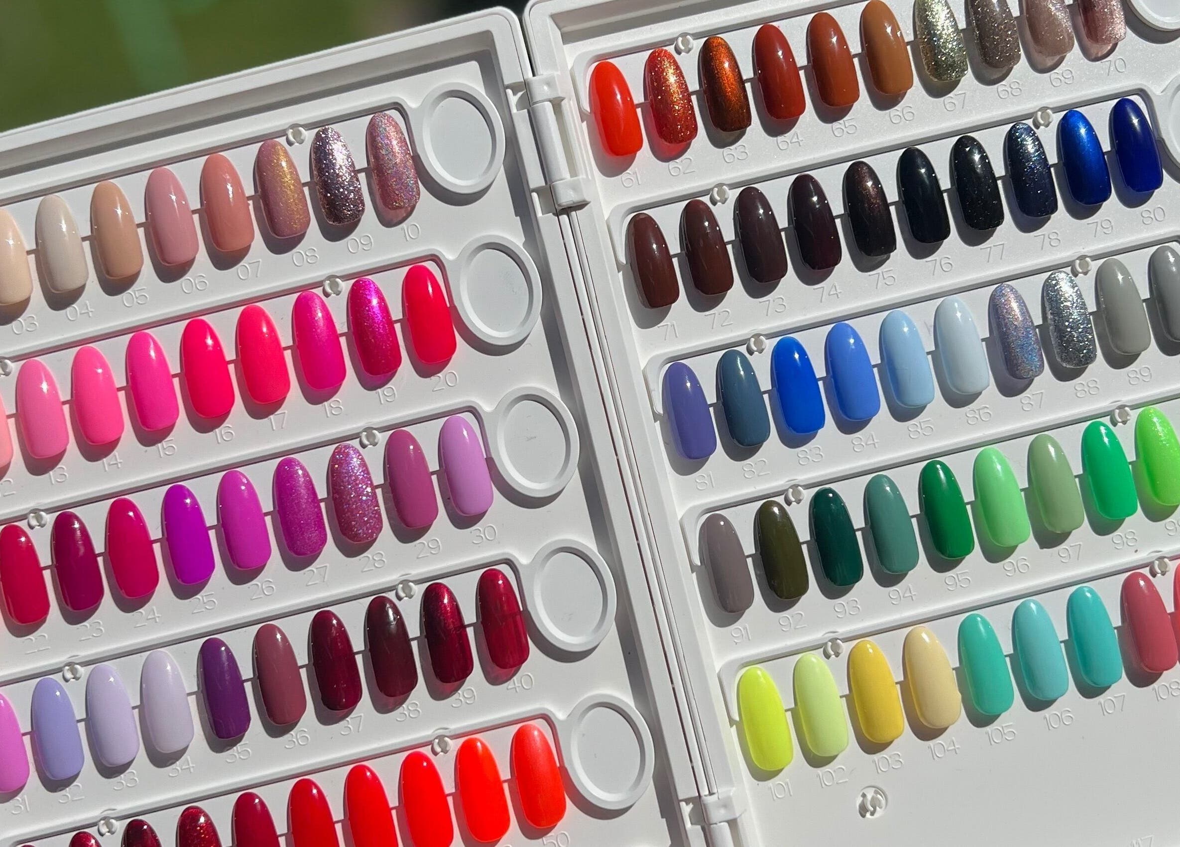 Colorful nail polish palette at The Beauty Hideaway, Tadcaster, England, GB showcases vibrant options.
