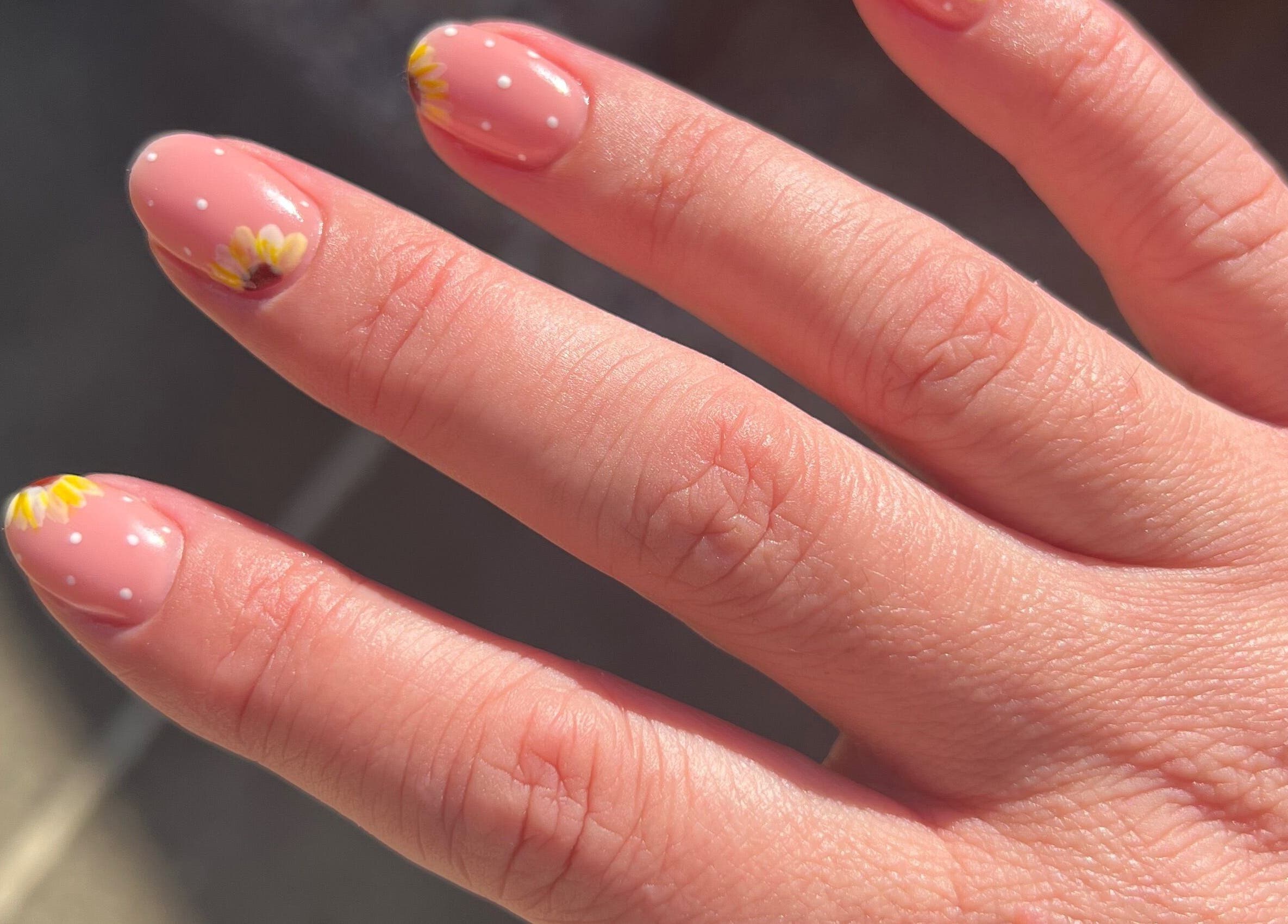 Close-up of floral nail art at The Beauty Hideaway, Tadcaster, England, GB.