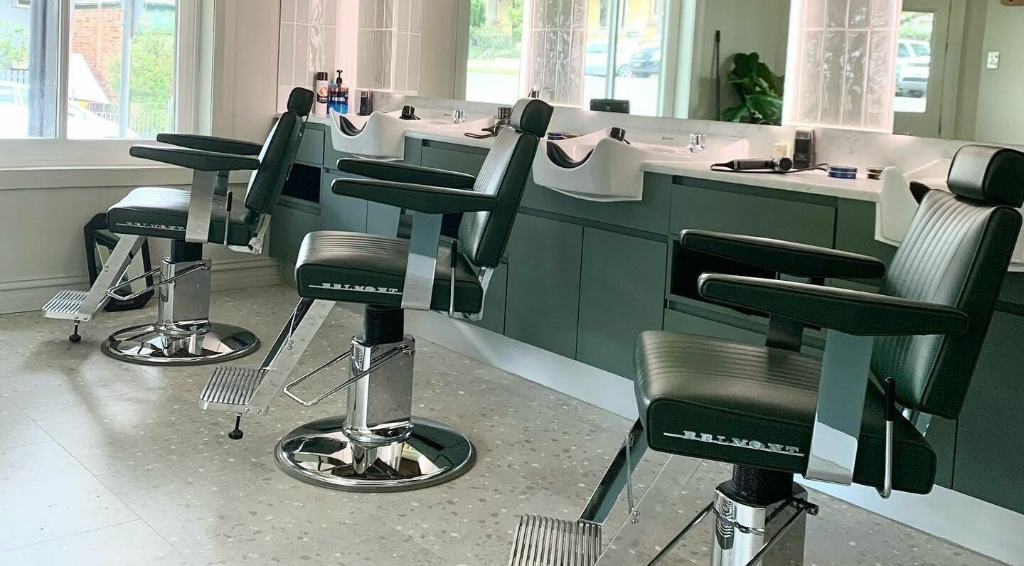 Sleek barber chairs at Gentry Barbers, Annandale, New South Wales, AU showcasing modern interior.