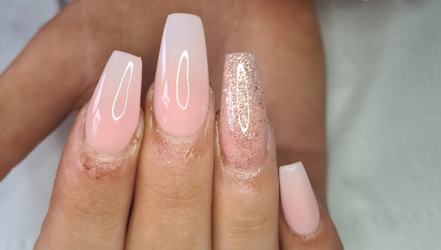 Elegant pink and glitter nails at Louise Doherty Beauty and Nails in Glasgow, Scotland, GB.