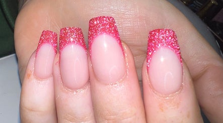 Glittery pink tipped nails at Louise Doherty Beauty and Nails, Glasgow, Scotland, GB.