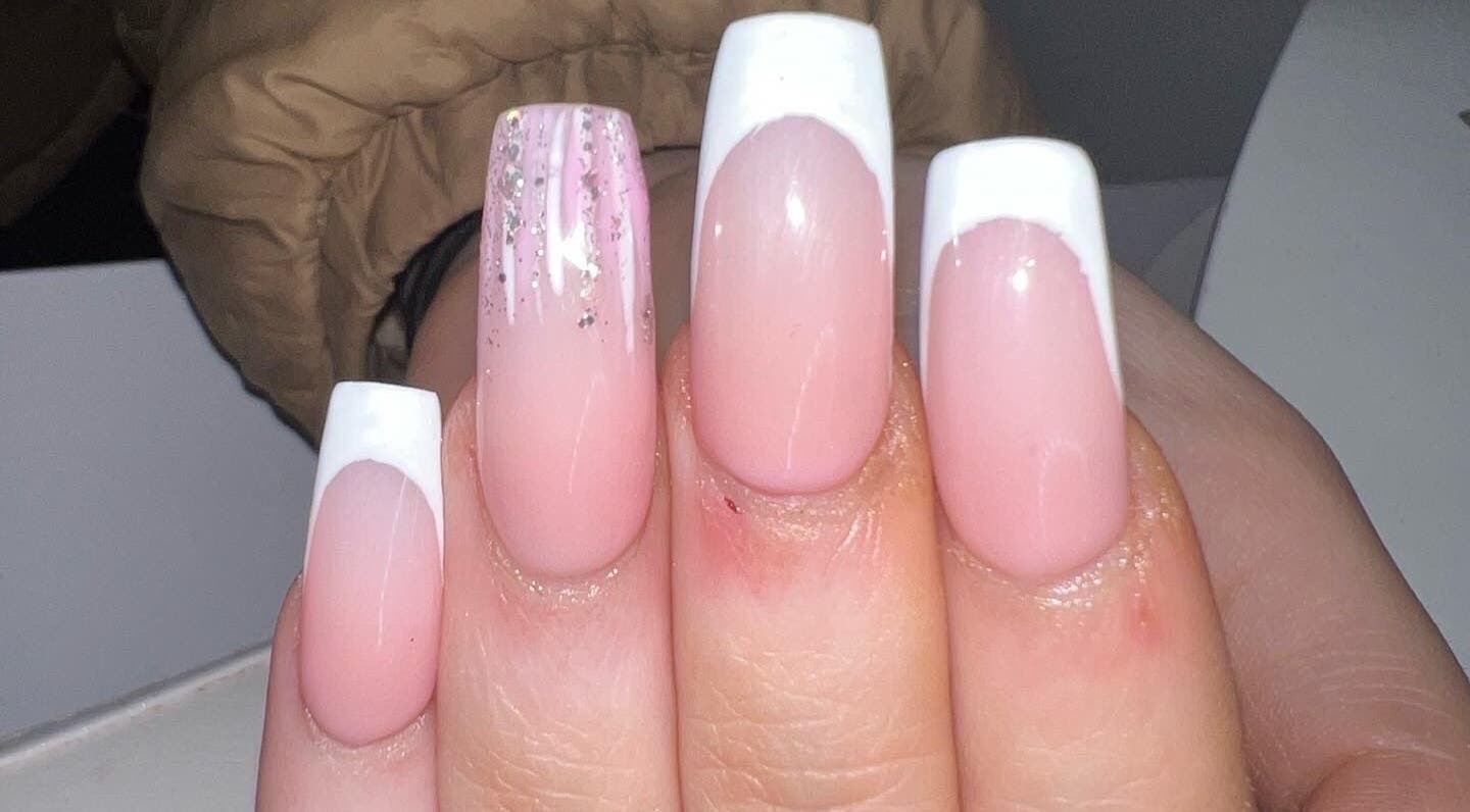 French manicure with glitter at Louise Doherty Beauty and Nails, Glasgow, Scotland, GB.